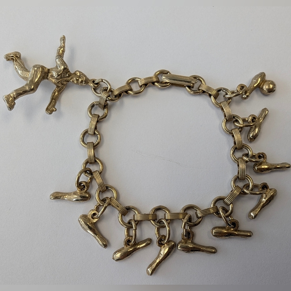 EVC GOLD TONE BOWLING BRACELET